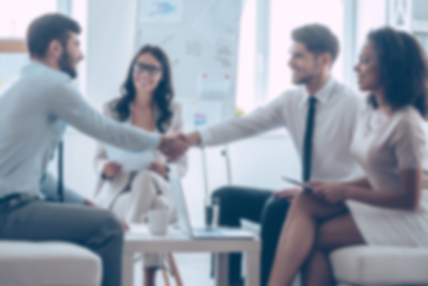 Business colleagues meeting in a bright office